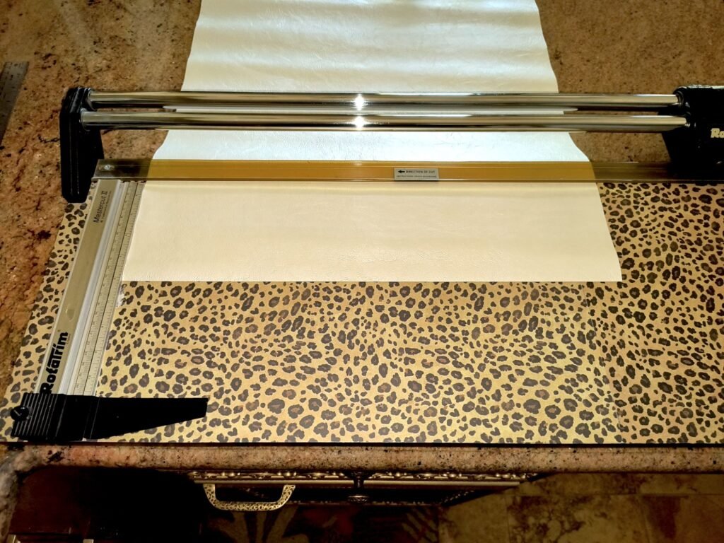 Shimmer leather loaded into paper cutter