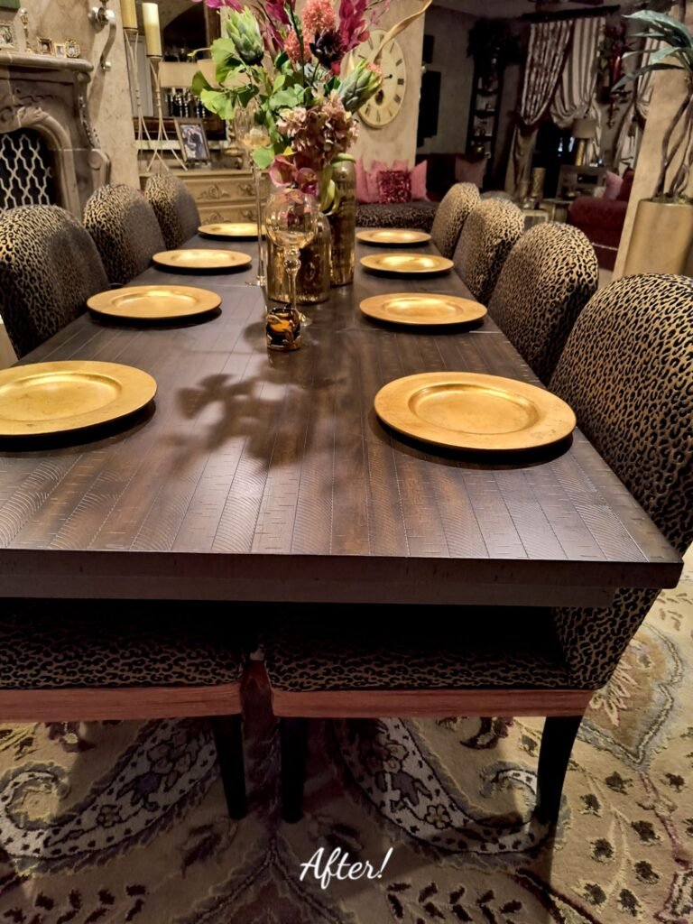 Finished DIY upholstery showing whole set of Dining Chairs with black and gold cheetah fabric