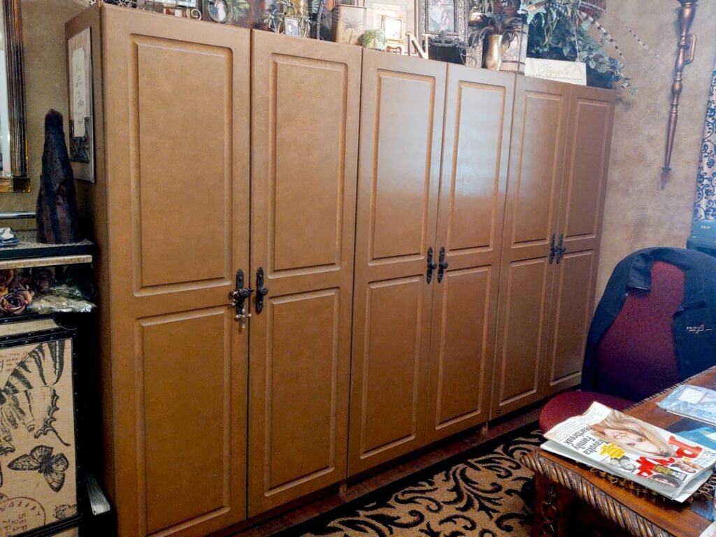 How to convert a spare bedroom into a Closet with an existing line of brown storage cabinets