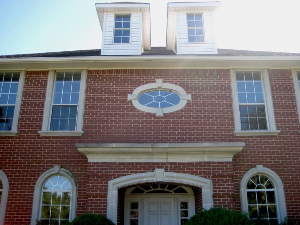 This house transformation included the removal of these 2 dormers