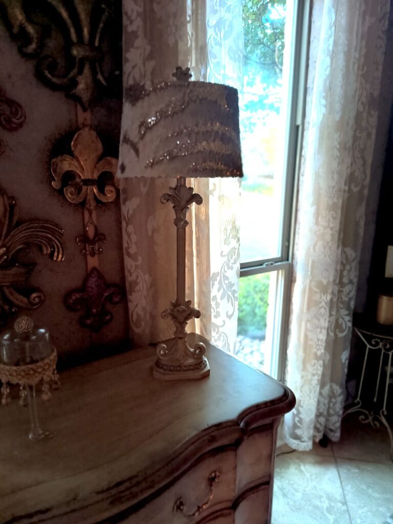 Cream and gold sequin fabric covering a lampshade