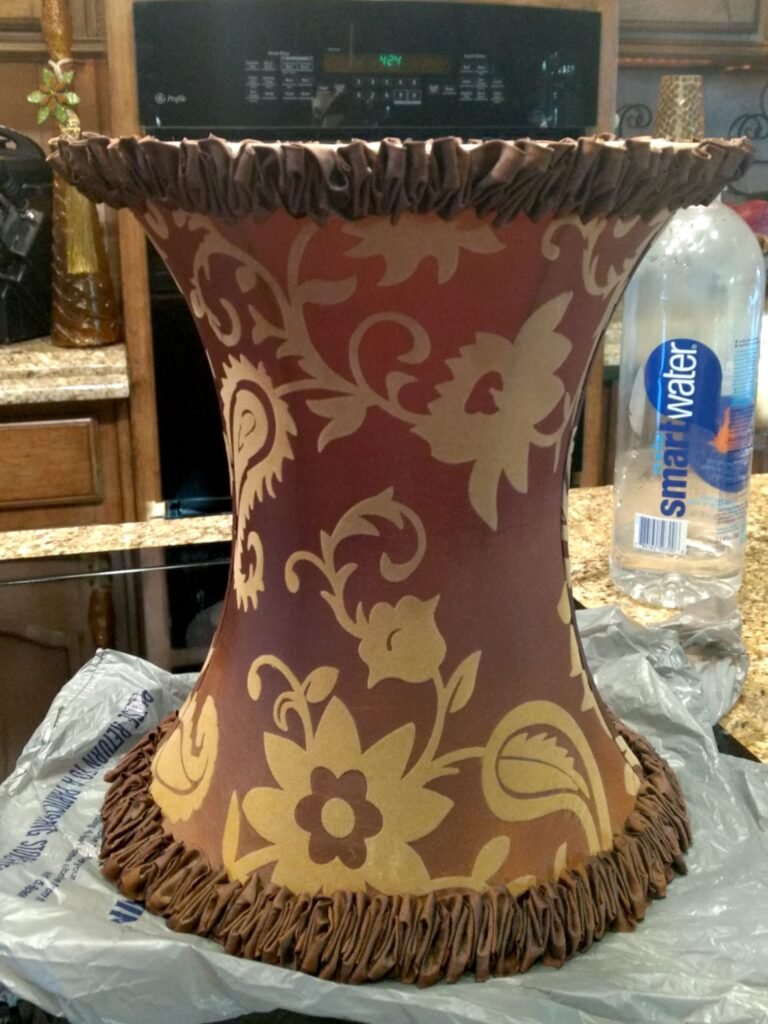 close up of brown and beige hourglass-shaped lampshade