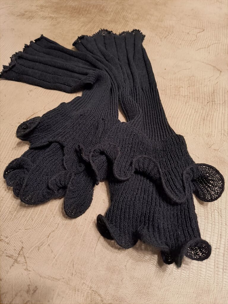 closeup of black DIY ruffled leg warmers