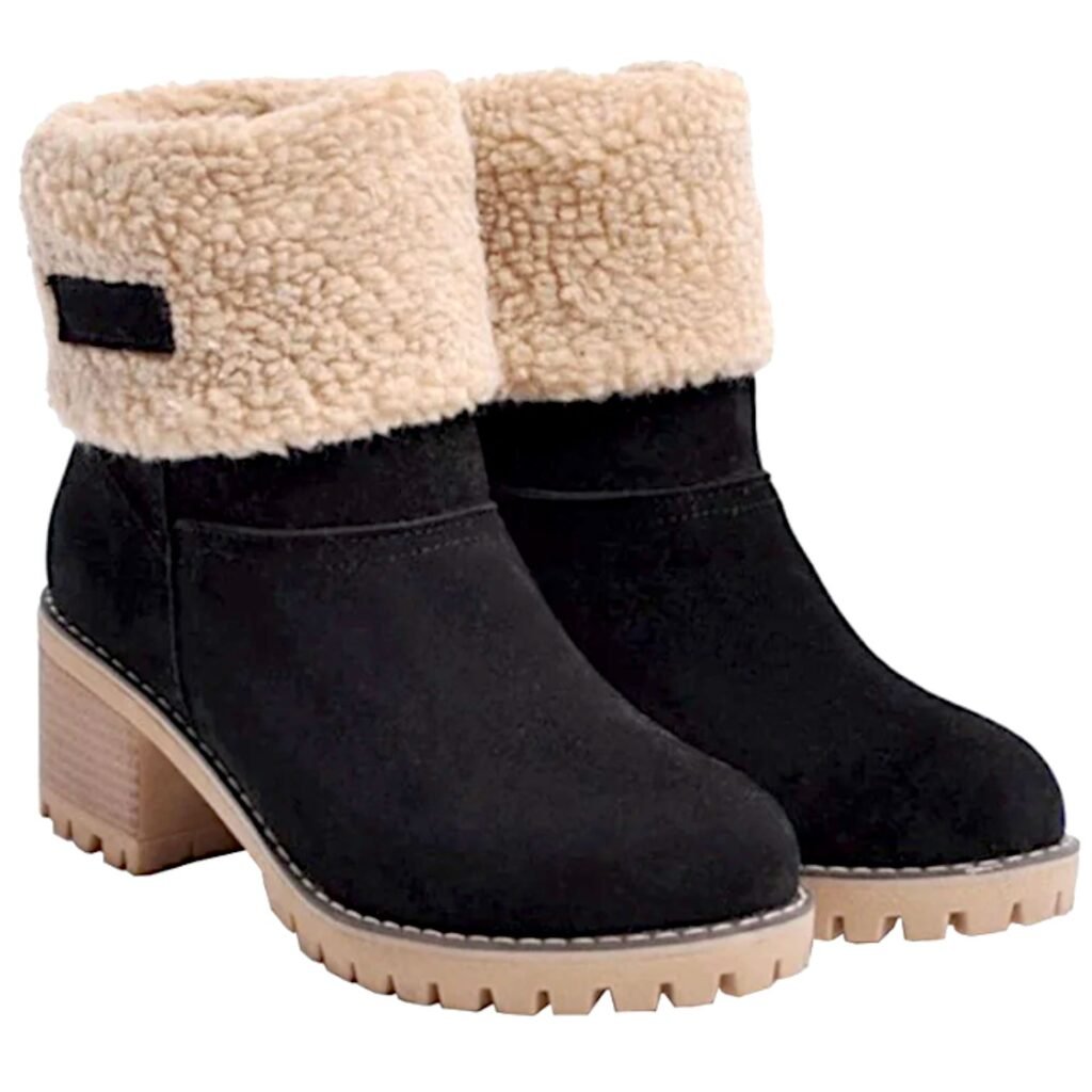 close up of a pair of low black suede boots with faux shearling leg warmers as short cuffs