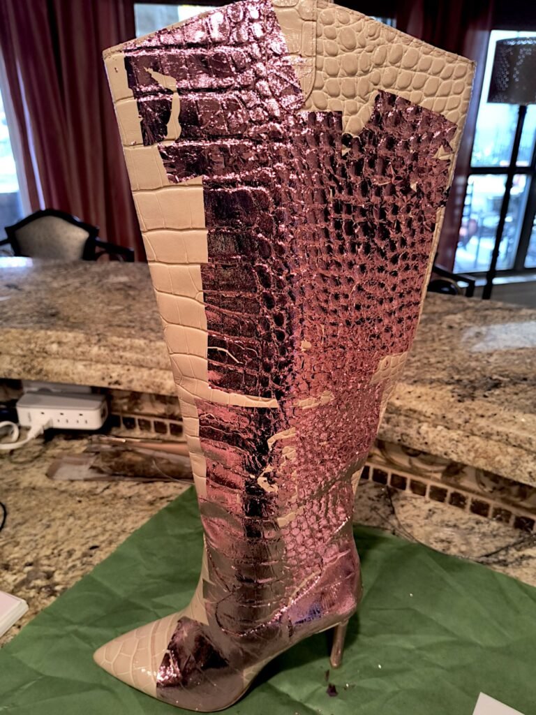 Boot upcycling showing partial coverage with high shine pink foil